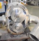 Used Waukesha 220 Positive Displacement Pump mounted on portable cart. Has a vented cover, 5