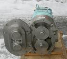 Used Waukesha Universal Rotary Positive Displacement Pump, Model 220, 316 Stainless Steel. Approximately 260 gallons per minute at 100 psi at 600 rpm capacity, .522 gallon displacement per revolution...