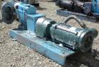 Used Waukesha Rotary Positive Displacement Pump, Model 030U2AP, 316 Stainless Steel. Approximately 36 gallons per minute at 100 psi at 600 rpm capacity, .06 gallon displacement per revolution. 1-1/2