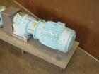 Used Waukesha Universal rotary positive displacement pump, model 30UL, 316 stainless steel. Approximate capacity 36 gallons per minute at 600 rpm. Jacketed cover, 1-1/2