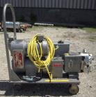 Used Waukesha Rotary Positive Displacement Pump, Model 030, 316 Stainless Steel. Approximately 36 gallons per minute at 100 psi at 600 rpm capacity, (.06) gallon displacement per revolution. 1 1/2