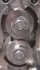 Used Waukesha Rotary Positive Displacement Pump, Model 030, 316 Stainless Steel. Approximately 36 gallons per minute at 100 psi at 600 rpm capacity, (.06) gallon displacement per revolution. 1 1/2