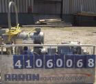 Used Waukesha Rotary Positive Displacement Pump, Model 030, 316 Stainless Steel. Approximately 36 gallons per minute at 100 psi at 600 rpm capacity, .06 gallon displacement per revolution. 1 1/2