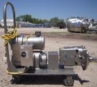 Used Waukesha Rotary Positive Displacement Pump, Model 030, 316 Stainless Steel. Approximately 36 gallons per minute at 100 psi at 600 rpm capacity, .06 gallon displacement per revolution. 1 1/2