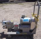Used Waukesha Rotary Positive Displacement Pump, Model 030, 316 Stainless Steel. Approximately 36 gallons per minute at 100 psi at 600 rpm capacity, .06 gallon displacement per revolution. 1 1/2