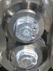 Used Waukesha Rotary Positive Displacement Pump, Model 30, 316 Stainless Steel. Approximately 36 gallons per minute at 100 psi at 600 rpm capacity, .06 gallon displacement per revolution. 1-1/2