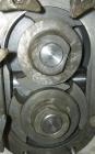 USED: Waukesha rotary positive displacement pump, model 030, 316stainless steel. Approximate capacity 36 gallons per minute at 600rpm. 1-1/2