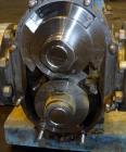 Used Waukesha Rotary Positive Displacement Pump, Model 320, 316 Stainless Steel. Approximately 450 gallons per minute at 200 psi at 600 rpm capacity, (0.754) gallon displacement per revolution. 6