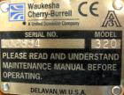 USED: Waukesha positive displacement pump parts consisting of (1) model 320 gear housing, (2) shafts and a 3 hp, 3/60/230/460 volt, 1725 rpm Dodge gearmotor, ratio 30. Mounted on a stainless steel st...