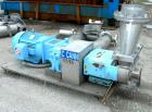 USED: Waukesha rectangular flange rotary positive displacement pump, model 324, 316 stainless steel. Approximately 300 gallons per minute, 75 gallons displacement per 100 revolutions. Top inlet with ...