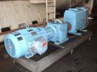 Used Waukesha Rotary Positive Displacement Pump, model 420, 316 stainless steel. Approximately 640 gallons per minute at 200 psi, 1.62 gallon displacement per revolution. 6