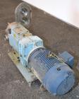 Used Waukesha Rotary Positive Displacement Pump, Model 60, 316 Stainless Steel. Approximately 90 gallons per minute at 200 psi at 600 rpm. (.153) gallons displacement per revolution. 2-1/2