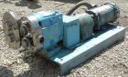Used Waukesha Rotary Positive Displacement Pump, Model AP-030, 316 Stainless Steel. Approximately 36 gallons per minute at 100 psi at 600 rpm capacity, .06 gallon displacement per revolution. 1-1/2