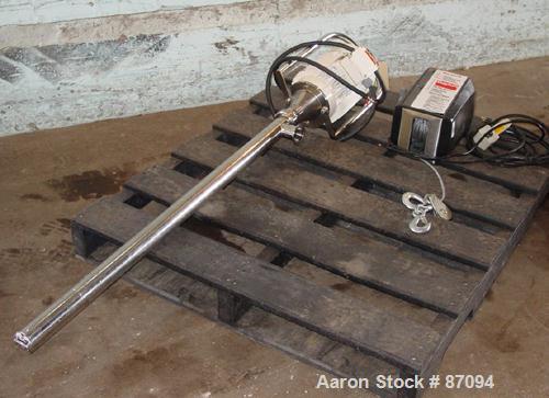 USED: Flux progressive cavity pump, model TTSE, stainless steel. Approximate 1" inlet, 36" long tube. Driven by a 1.5 hp motor. Includes a pump attachment and a Dayton electric hoist.