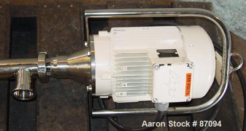 USED: Flux progressive cavity pump, model TTSE, stainless steel. Approximate 1" inlet, 36" long tube. Driven by a 1.5 hp motor. Includes a pump attachment and a Dayton electric hoist.