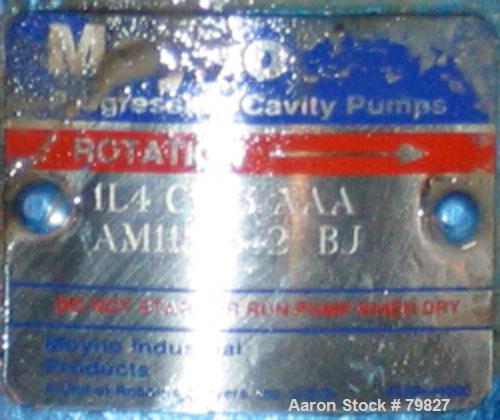 USED:Moyno progressive cavity pump, carbon steel, model 1L4, typeCDQ. 2-1/2" suction, 2-1/4" NPT discharge, cast iron/hardened steelhousing, Buna-N stator, thru torque arm, driven by a 2 hp, 3/60/230...