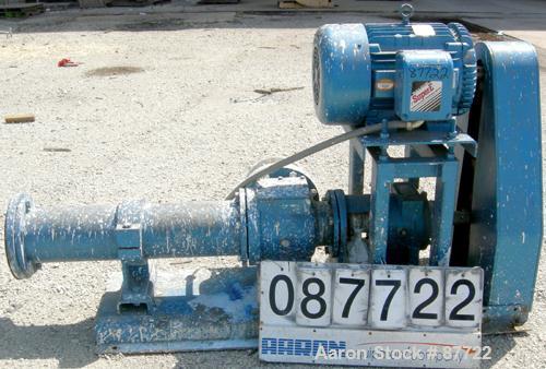 USED: Moyno Centennial progressing cavity pump, 2 stage, model 2G065G1CDQAAA, cast iron. 8" inlet/outlet. Nitrile stator, approximate capacity 262 gallons per minute at 575 rpm at 45 psi. Driven by a...