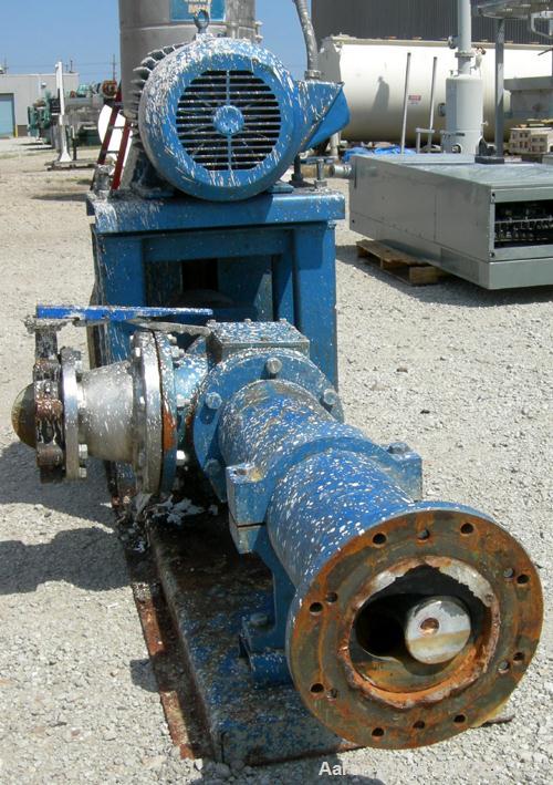 Used Moyno Centennial Progressing Cavity Pump, 2 Stage, Model 2G065G1CDYAAA, Cast Iron. 8" Inlet/outlet. Nitrile stator, approximate capacity 262 gallons per minute at 575 rpm at 45 psi. Driven by a ...