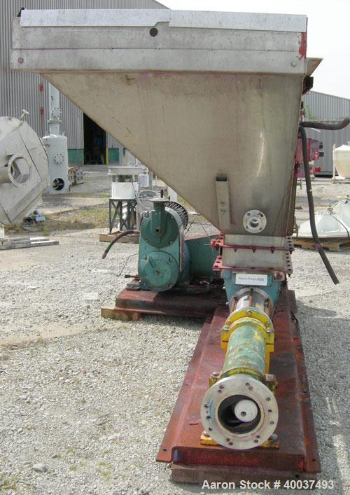 Used Moyno pump, model 2JOJS3 SSQ, trim AEA-NK. Open throat design with lump breaker, and feed screw. 8" discharge. 316 stainless steel hopper and rotor, nitrile stator. Driven by a 10hp,3/60/230/460...
