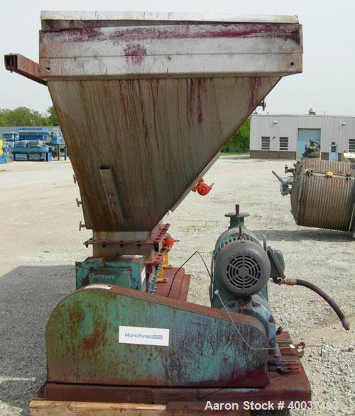 Used Moyno pump, model 2JOJS3 SSQ, trim AEA-NK. Open throat design with lump breaker, and feed screw. 8" discharge. 316 stainless steel hopper and rotor, nitrile stator. Driven by a 10hp,3/60/230/460...