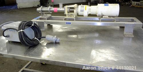 Used Moyno Sanitary Progressive Cavity Pump, Model Frame FB1C, Type SSE, Trim SAB, Stainless Steel. Nitrile rubber stator, Approximate 10 gallons per minute. 2" Tri-clamp inlet/outlet. Driven by a 1h...