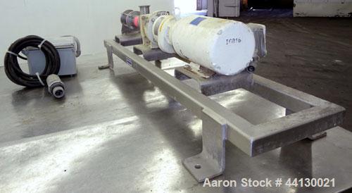 Used Moyno Sanitary Progressive Cavity Pump, Model Frame FB1C, Type SSE, Trim SAB, Stainless Steel. Nitrile rubber stator, Approximate 10 gallons per minute. 2" Tri-clamp inlet/outlet. Driven by a 1h...