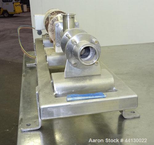 Used Moyno Sanitary Progressive Cavity Pump, Model Frame FB1C, Type SSE, Trim SAB, Stainless Steel. Nitrile rubber stator, Approximate 10 gallons per minute. 2" Tri-clamp inlet/outlet. Driven by a 1h...
