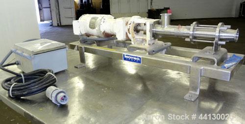 Used Moyno Sanitary Progressive Cavity Pump, Model Frame FB1C, Type SSE, Trim SAB, Stainless Steel. Nitrile rubber stator, Approximate 10 gallons per minute. 2" Tri-clamp inlet/outlet. Driven by a 1h...