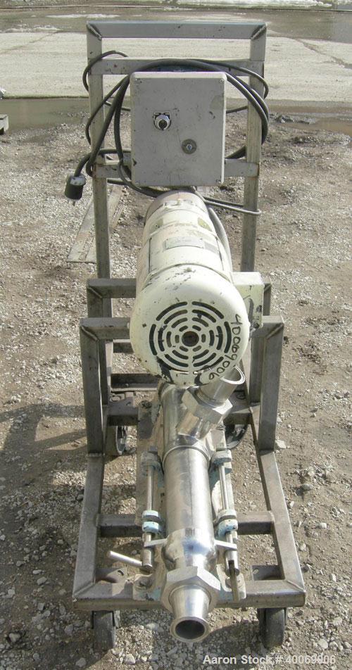 Used:  Moyno Sanitary Pump, Type SSQ, 316 Stainless Steel.  Rated 5 gallons per minute per 100 rpm.   Driven by a 1.5 hp, 1750 rpm motor.  Mounted on a stainless steel frame on casters.  Includes a c...