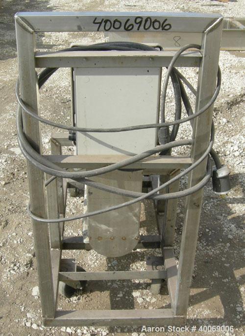 Used:  Moyno Sanitary Pump, Type SSQ, 316 Stainless Steel.  Rated 5 gallons per minute per 100 rpm.   Driven by a 1.5 hp, 1750 rpm motor.  Mounted on a stainless steel frame on casters.  Includes a c...