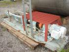 Used Moyno 2 Stage Processing Cavity Pump, Model 2G0GS2/SSQ, Trim AAA. 36 gallons per revolution at 160 psi. Open throat design with feed screw. 5 1/2