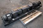 Used Moyno 1000 Single Stage Progressing Cavity Pump, Model A1GCDQSAA. Approximate 22 gallons per 100 revolutions, 50 gallons per minute. 316 Stainless steel suction chamber, standard packing, chrome...