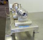 Used Moyno Sanitary Progressive Cavity Pump, Model Frame FB1C, Type SSE, Trim SAB, Stainless Steel. Nitrile rubber stator, Approximate 10 gallons per minute. 2