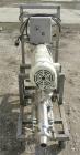 Used:  Moyno Sanitary Pump, Type SSQ, 316 Stainless Steel.  Rated 5 gallons per minute per 100 rpm.   Driven by a 1.5 hp, 1750 rpm motor.  Mounted on a stainless steel frame on casters.  Includes a c...