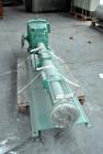 Used Netzsch Progressive Cavity Pump, Type NE60A. 4’’ Inlet, 4’’ outlet. Driven by a 10kw (13hp), 3/50/500 volt, 1465 rpm motor. Base mounted.