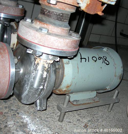 Used:  Waukesha centrifugal pump, model 2065, stainless steel. 2-1/2" tri clamp inlet, 2" tri clamp outlet. Approximate 5-1/...