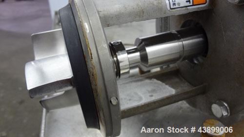 Used Ampco Centrifugal Pump, Model C114MD14T-S, 316 Stainless Steel. Approximately 15 gallons per minute.  1-1/2" Tri-clamp inlet/outlet.  Driven by a 2 hp, 3/60/208-230/460 volt, 1725 rpm motor.  Mo...