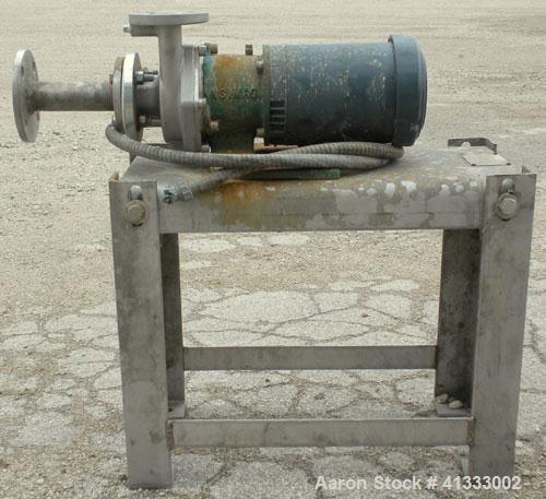 Used Ansimag Centrifugal Pump, model KM1515-AA, stainless steel. Rated approximately 50 gallons per minute at 10’ head. 1-1/2’’ inlet, 1’’ outlet, approximate 3-1/2" diameter impeller. Driven by a 1-...