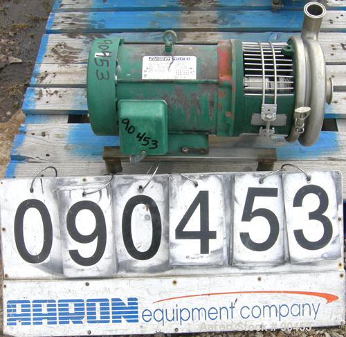 Used: Tri Clover centrifugal pump, model C218MD18T-S-3-18, 316 stainless steel. Approximately 95 gallons per minute at 45' head at 20 psi. 2" inlet, 1 1/2" outlet, 7" diameter impeller. Driven by a 3...