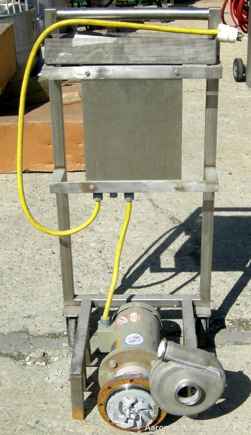 Used Fristam Centrifugal Pump, Model FT202-115, 317 Stainless Steel. 2" tri clamp inlet, 2-1/2" tri clamp outlet. Approximate capacity 140 gallons per minute at 80' head. Direct driven by a 3 HP, 3/6...