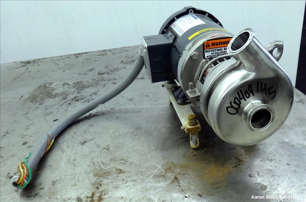 Used Top-Flo Centrifugal Pump, Model C114-56C, 316 Stainless Steel. Approximate 40 gallons per minute at 40' head. 2" Tri-clamp inlet, 1-1/2" tri-clamp outlet. Driven by a 1-1/2hp, 3/60/208-230/460 v...