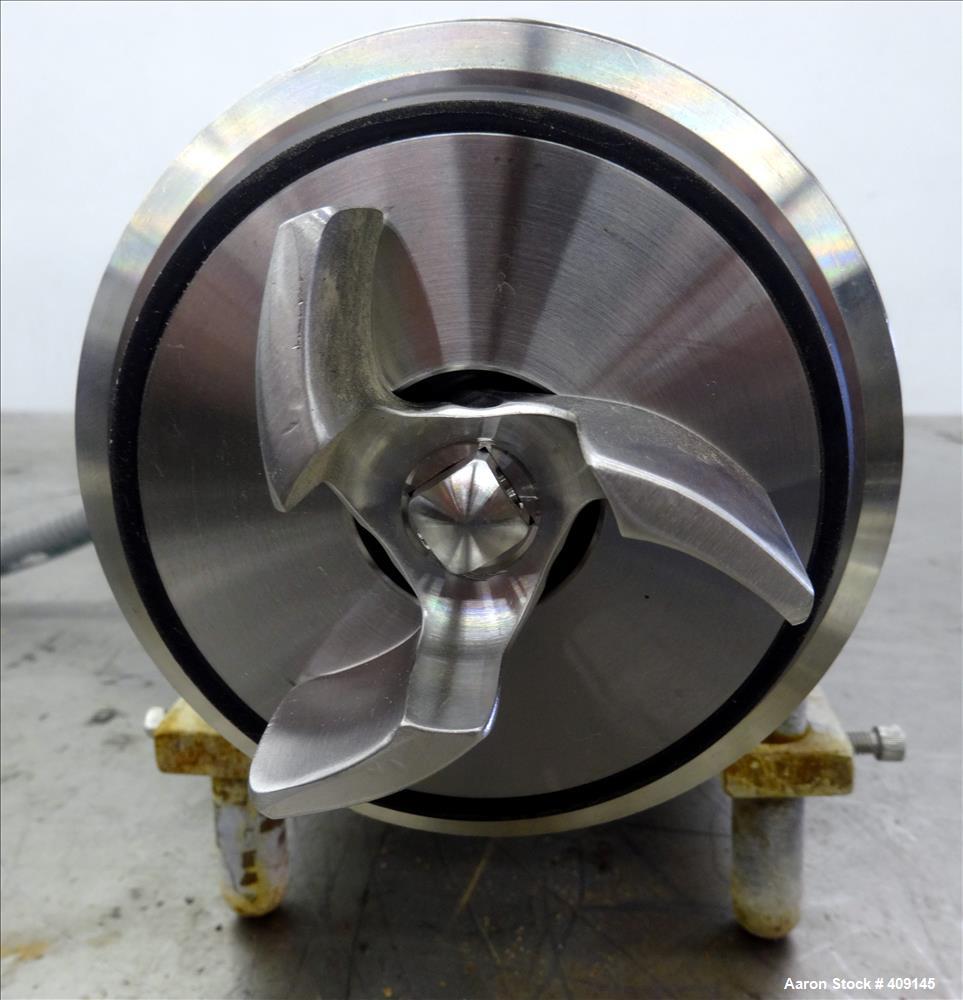 Used Top-Flo Centrifugal Pump, Model C114-56C, 316 Stainless Steel. Approximate 40 gallons per minute at 40' head. 2" Tri-clamp inlet, 1-1/2" tri-clamp outlet. Driven by a 1-1/2hp, 3/60/208-230/460 v...