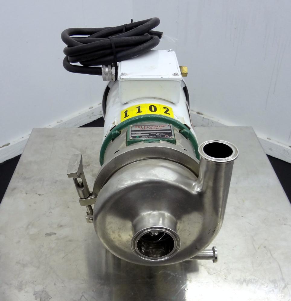 Used Tri-Clover Tri-Flo H.D. Series Centrifugal Pump, Model C215MDG56T-S, 316 Stainless Steel.  Approximate capacity 60 gallons per minute.  2” Tri-clamp inlet, 1-1/2” tri-clamp outlet.  Driven by a ...