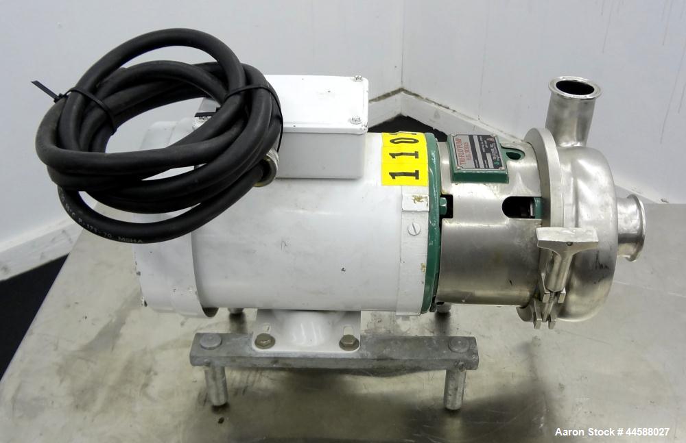 Used Tri-Clover Tri-Flo H.D. Series Centrifugal Pump, Model C215MDG56T-S, 316 Stainless Steel.  Approximate capacity 60 gallons per minute.  2” Tri-clamp inlet, 1-1/2” tri-clamp outlet.  Driven by a ...