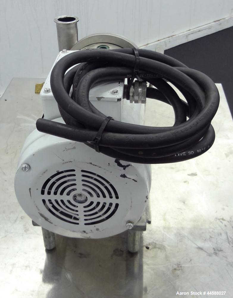 Used Tri-Clover Tri-Flo H.D. Series Centrifugal Pump, Model C215MDG56T-S, 316 Stainless Steel.  Approximate capacity 60 gallons per minute.  2” Tri-clamp inlet, 1-1/2” tri-clamp outlet.  Driven by a ...