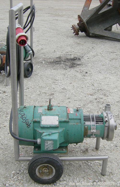 Used Tri Clover Centrifugal Pump, model C216MD21T-S, 316 stainless steel. 2" tri-clamp inlet, 1 1/2" tri-clamp outlet. Approximate capacity 160 gallons per minute at 110' head. Approximate 5" diamete...