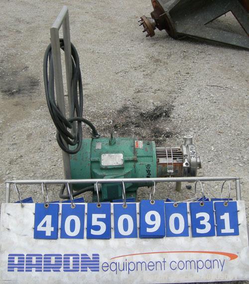 Used Tri-Clover Centrifugal Pump, model C216MD21T-S, 316 stainless steel. 2" tri-clamp inlet, 1 1/2" tri-clamp outlet. Approximate capacity 160 gallons per minute at 110' head. Approximate 5'' diamet...