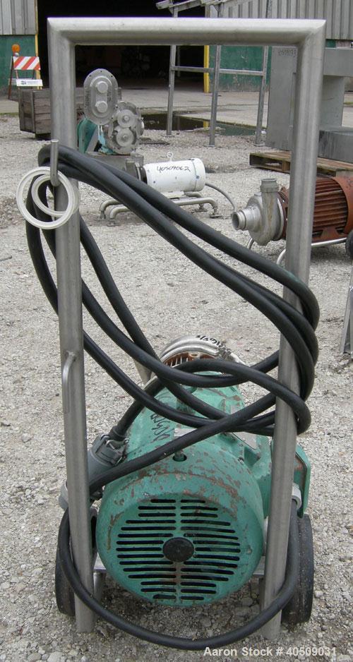 Used Tri-Clover Centrifugal Pump, model C216MD21T-S, 316 stainless steel. 2" tri-clamp inlet, 1 1/2" tri-clamp outlet. Approximate capacity 160 gallons per minute at 110' head. Approximate 5'' diamet...