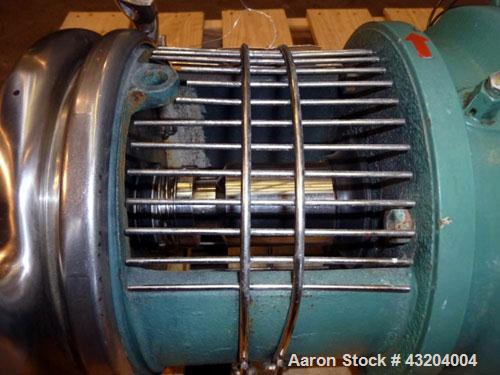 Used Tri-Clover Centrifugal Pump, Model C216MD25T-S-KX, Stainless Steel. 2’’ Tri-clamp inlet, 1-1/2’’ tri-clamp outlet.Approximate capacity 220 gallons per minute at 110’ head.Driven by a 15 hp, 3/60...