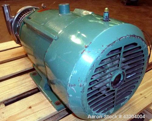 Used Tri-Clover Centrifugal Pump, Model C216MD25T-S-KX, Stainless Steel. 2’’ Tri-clamp inlet, 1-1/2’’ tri-clamp outlet.Approximate capacity 220 gallons per minute at 110’ head.Driven by a 15 hp, 3/60...